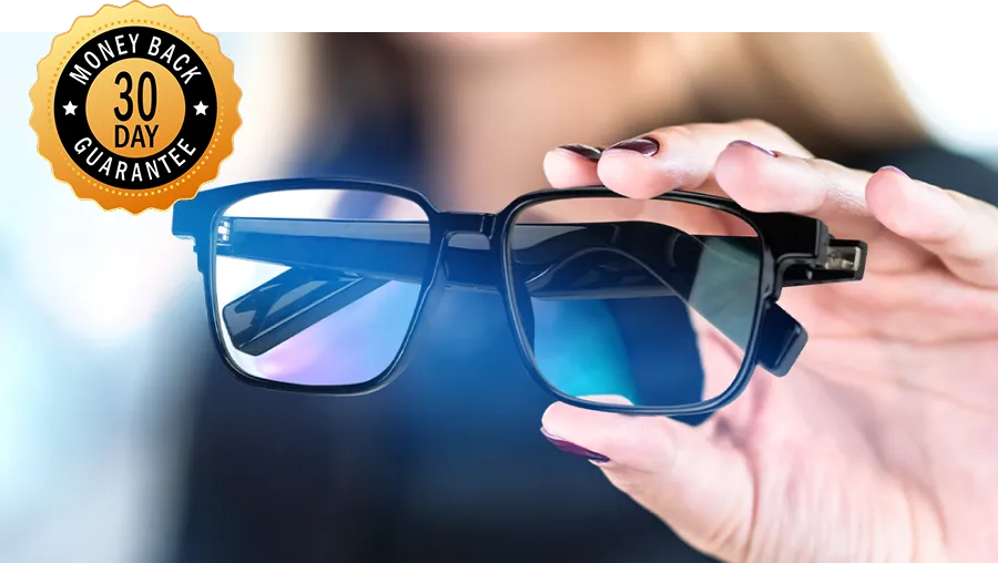 Hand holding NeuroView glasses with blue light blocking lenses